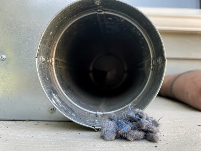 South San Jose Hills Dryer Vent Cleaning technician using specialized equipment to clear severe dryer vent blockage in South San Jose Hills
